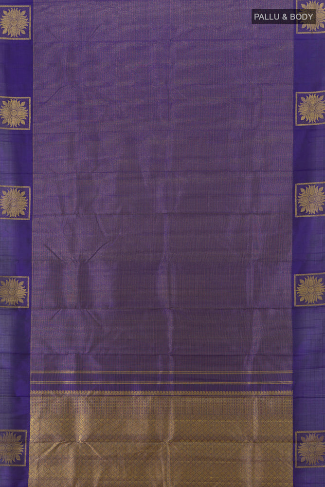 Flat view of Pure Silk Pure Zari Violet Kanjivaram Saree with Zari Butta on the body and Silk Border. 
