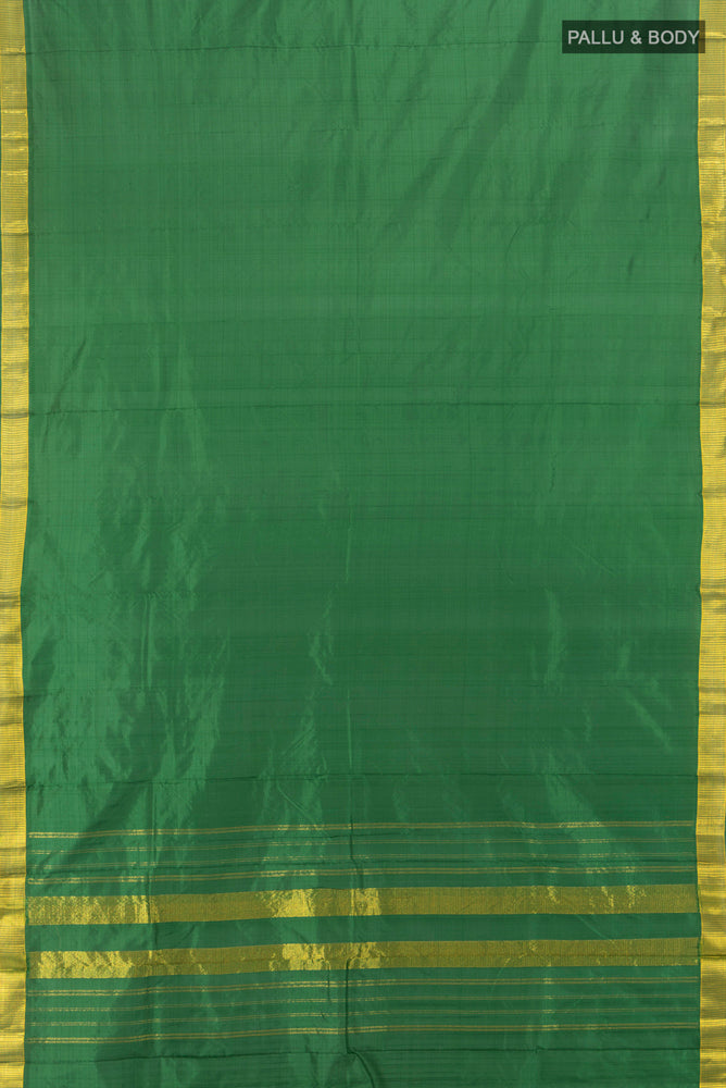 Flat view of Bottle Green Kanjivaram Silk Saree with Plain Body and Silk Border. 