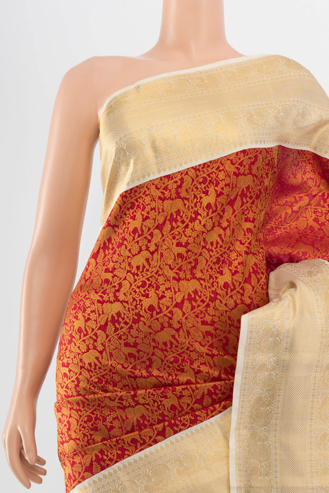 Border image of Pure Silk Pure Zari Maroon Kanchipuram Saree with Zari Butta on the body and Silk Border. 