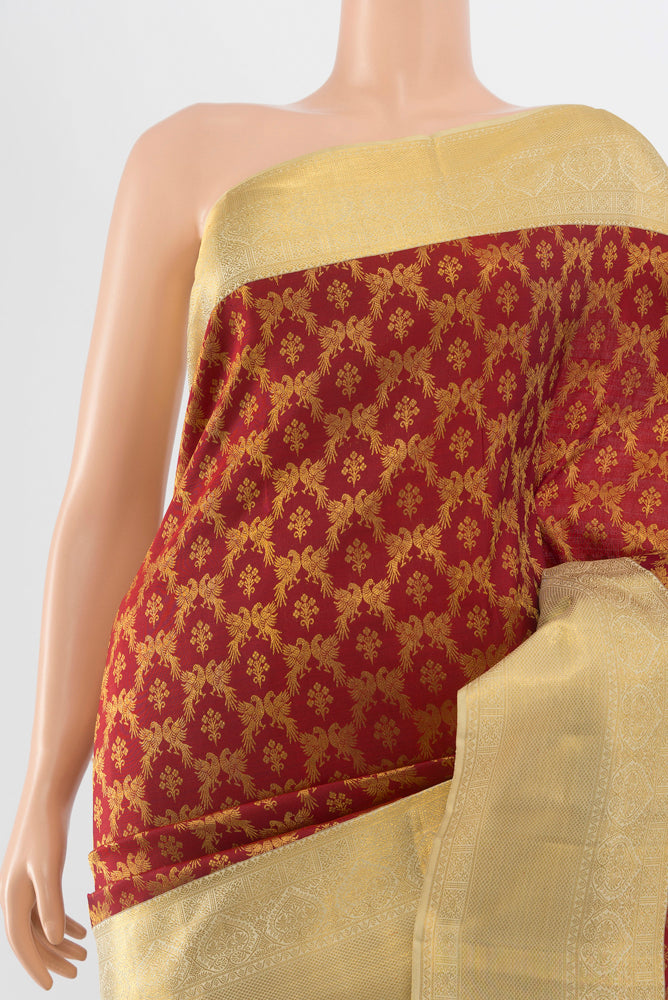 Border image of Maroon Kanchipuram Silk Saree with Zari Brocade on the body and Silk Border. 