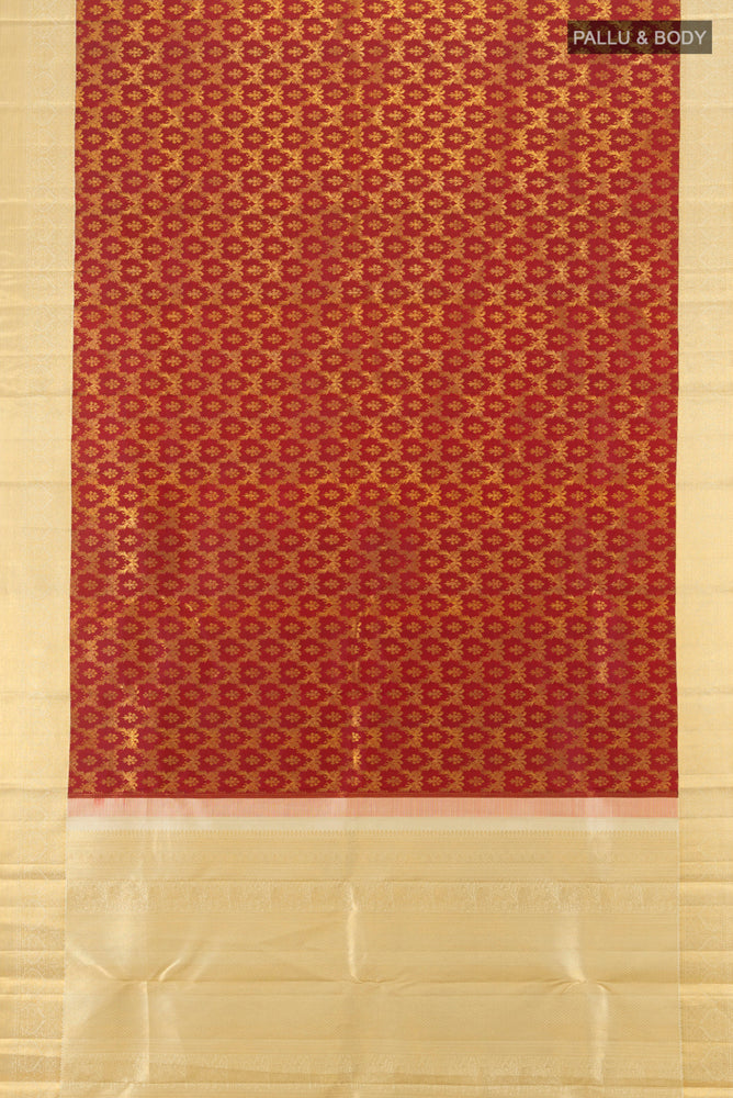 Flat view of Maroon Kanchipuram Silk Saree with Zari Brocade on the body and Silk Border. 