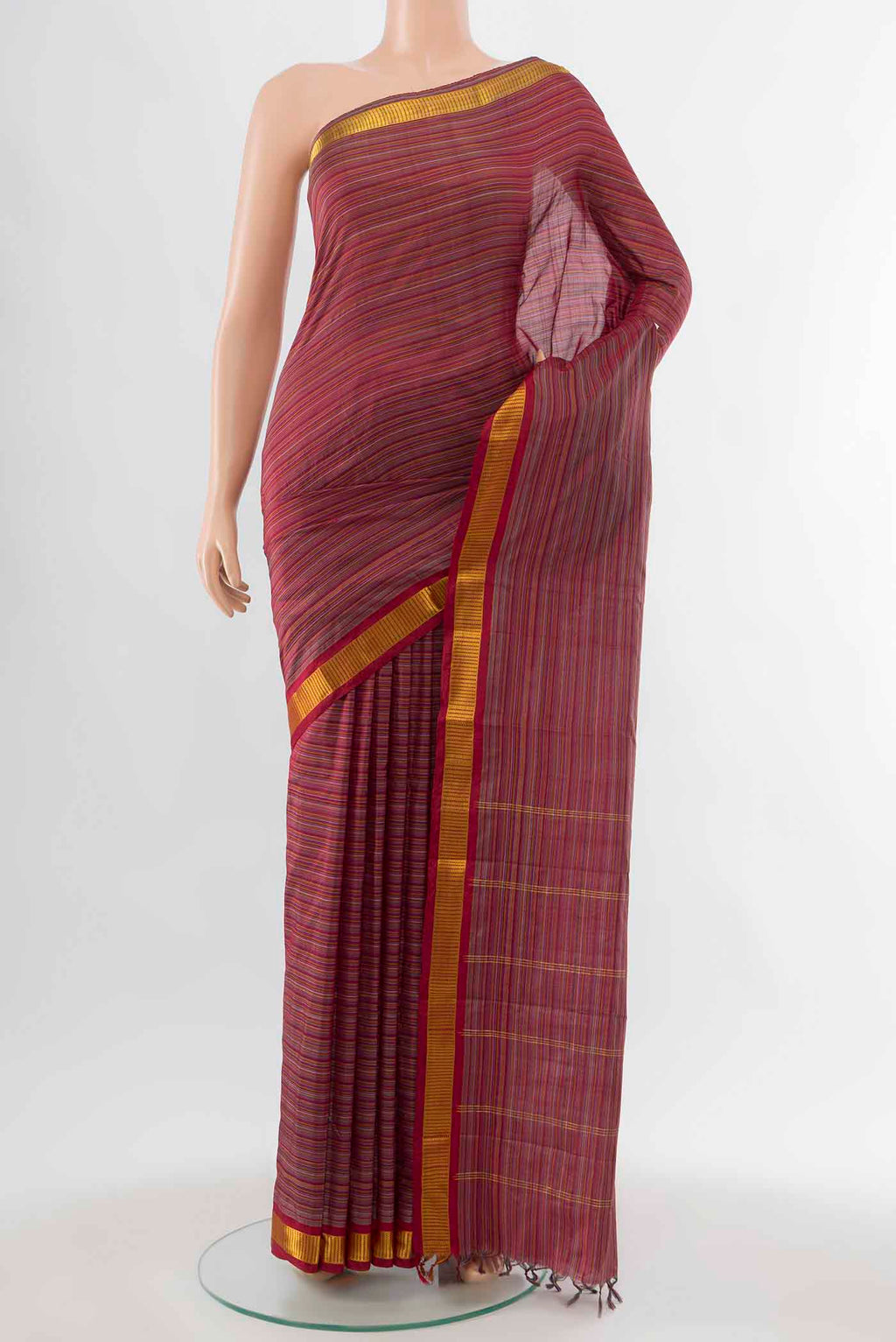Maroon Kanchipuram Silk Saree with Stripes on the body and Zari Border displayed on a mannequin