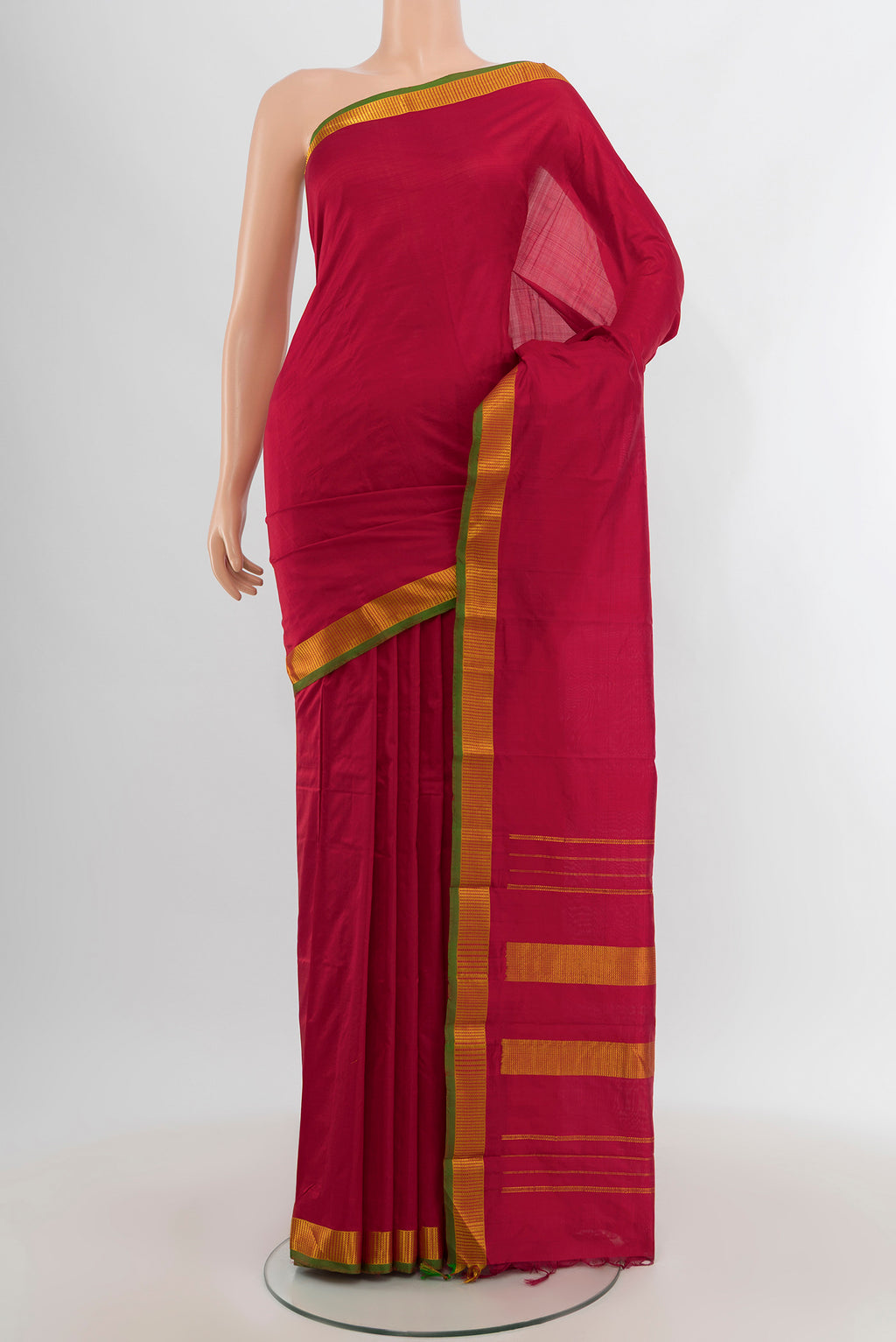 Red Kanjivaram Silk Saree with Plain Body and Zari Border.  displayed on a mannequin