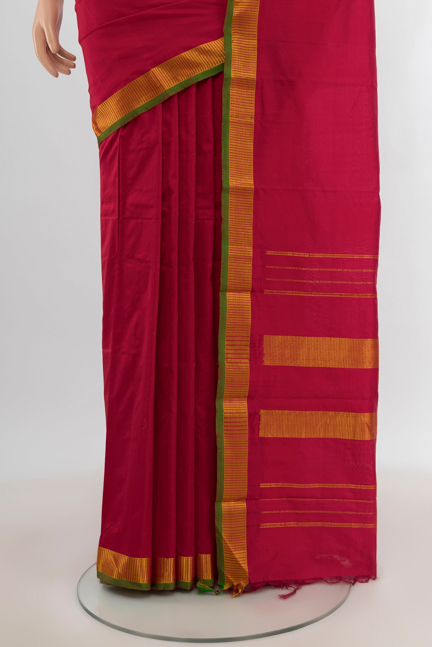 Pleats and pallu of Red Kanjivaram Silk Saree with Plain Body and Zari Border. 