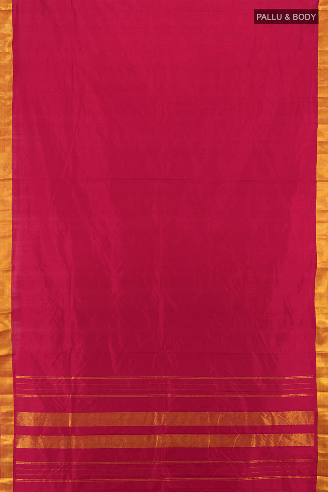 Flat view of Maroon Kanjivaram Silk Saree with Plain Body and Silk Border. 