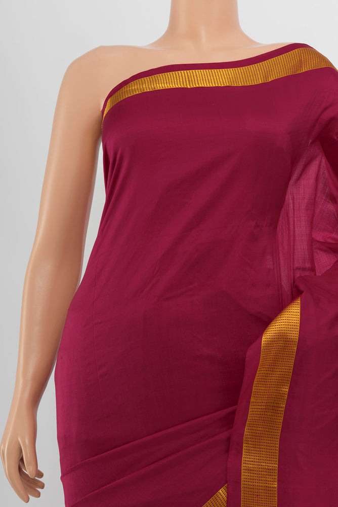 Border image of Maroon Kanjivaram Silk Saree with Plain Body and Silk Border. 