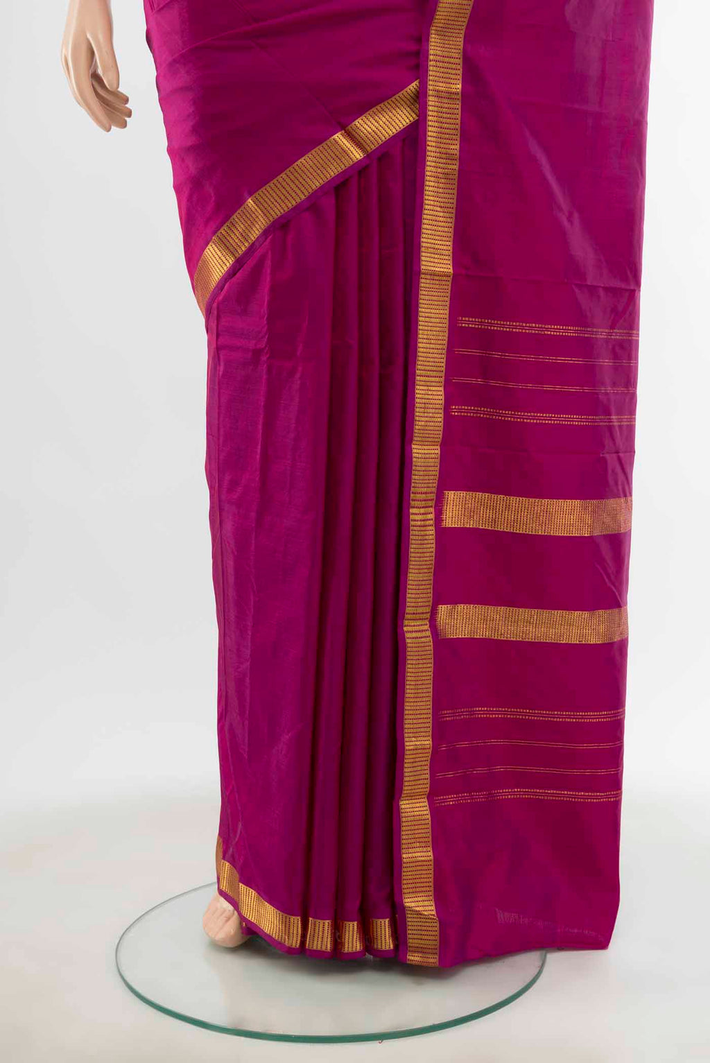Pleats and pallu of Purple Kanchipuram Silk Saree with Zari Butta on the body and Silk Border