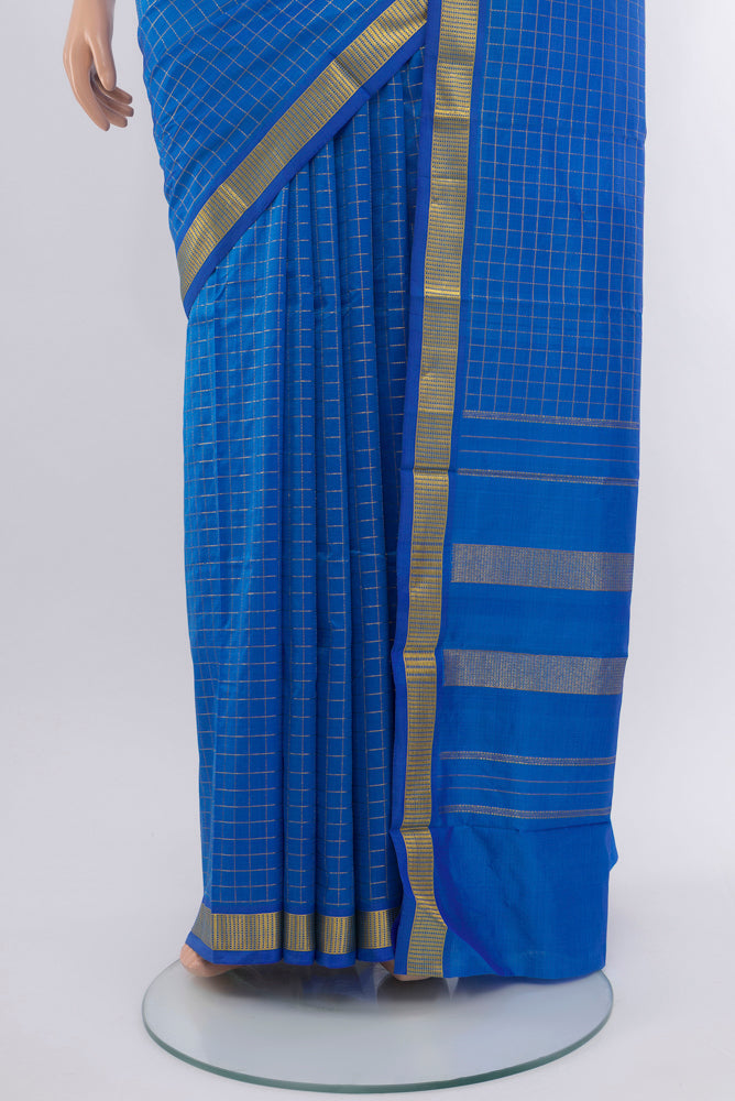 Pleats and pallu of Light Blue Kanchipuram Silk Saree with Checked design on the body and Silk Border. 