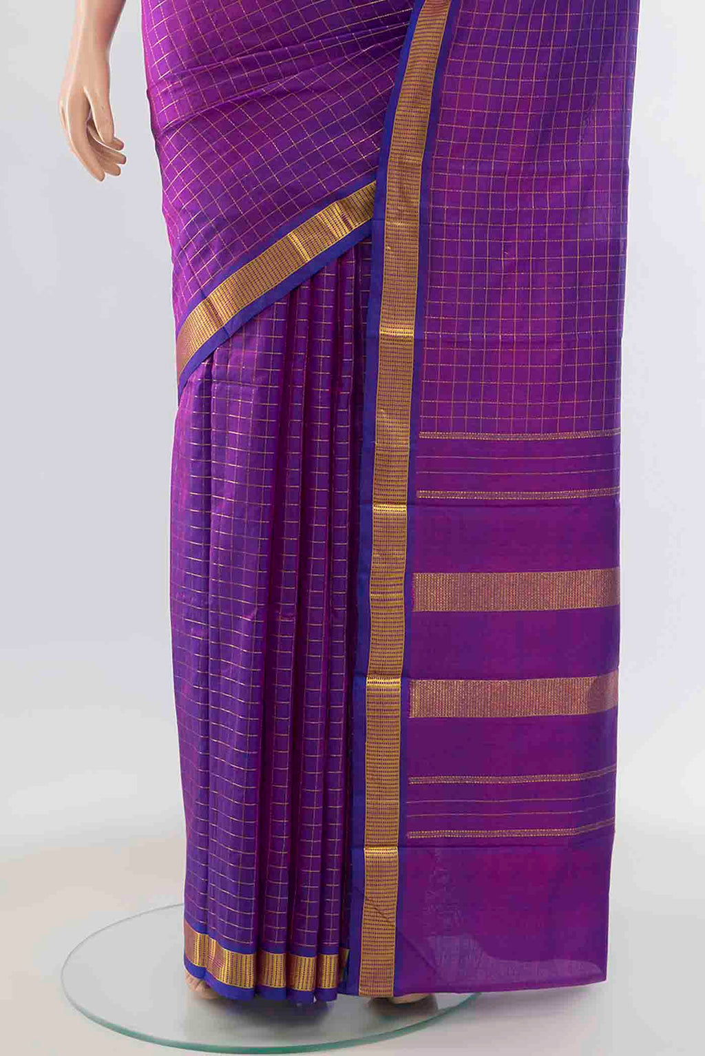 Pleats and pallu of Purple Kanchipuram Silk Saree with Checked design on the body and Zari Border