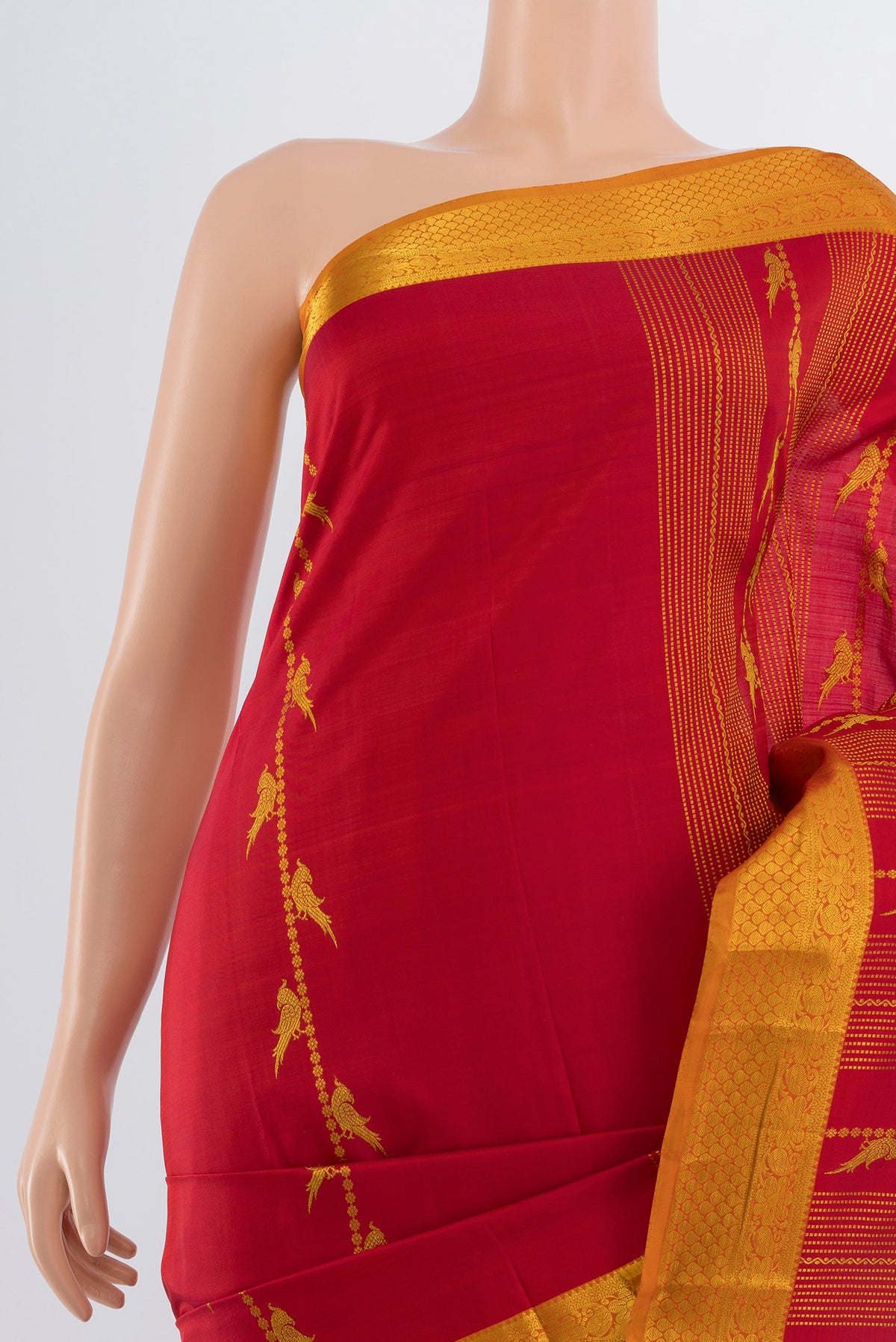 Border image of Maroon Kanjivaram Silk Saree with Zari Butta on the body and Silk Border. 