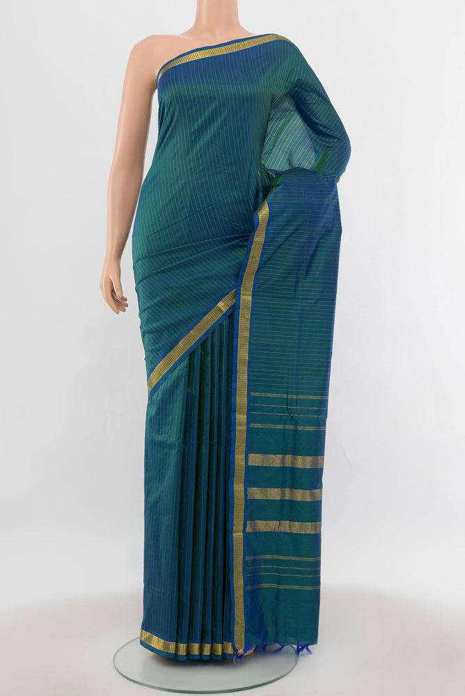 Peacock Blue Kanjivaram Silk Nine Yards Saree with Zari Butta on the body and Silk Border.  displayed on a mannequin