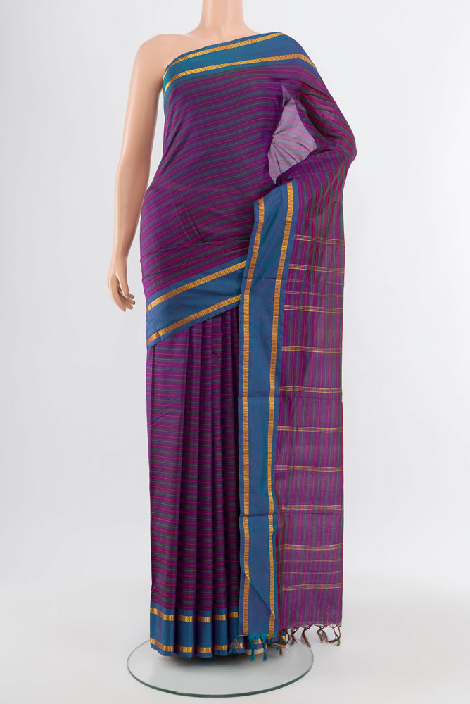Rust Kanjivaram Silk Nine Yards Saree with Plain Body and Silk Border.  displayed on a mannequin