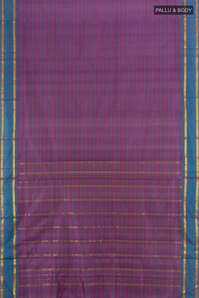 Flat view of Rust Kanjivaram Silk Nine Yards Saree with Plain Body and Silk Border. 