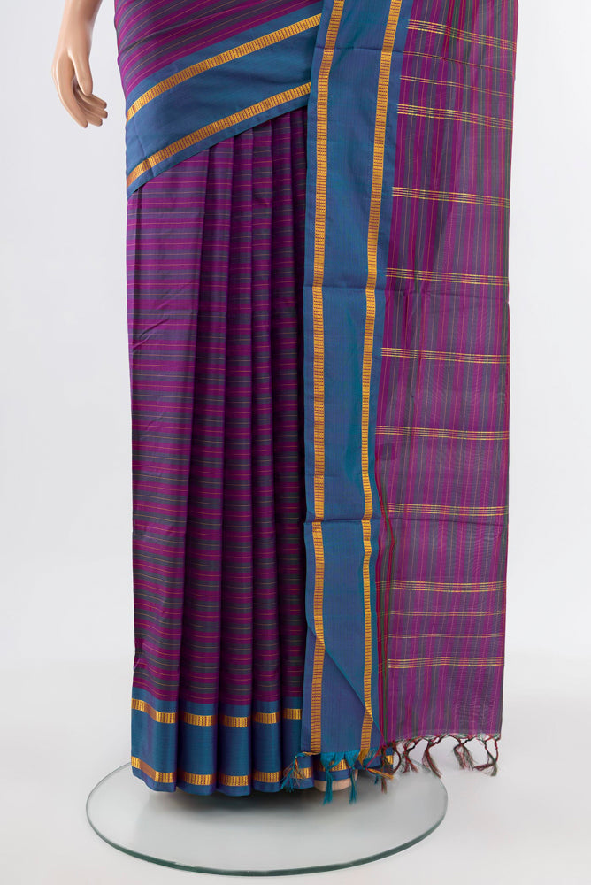 Pleats and pallu of Rust Kanjivaram Silk Nine Yards Saree with Plain Body and Silk Border. 