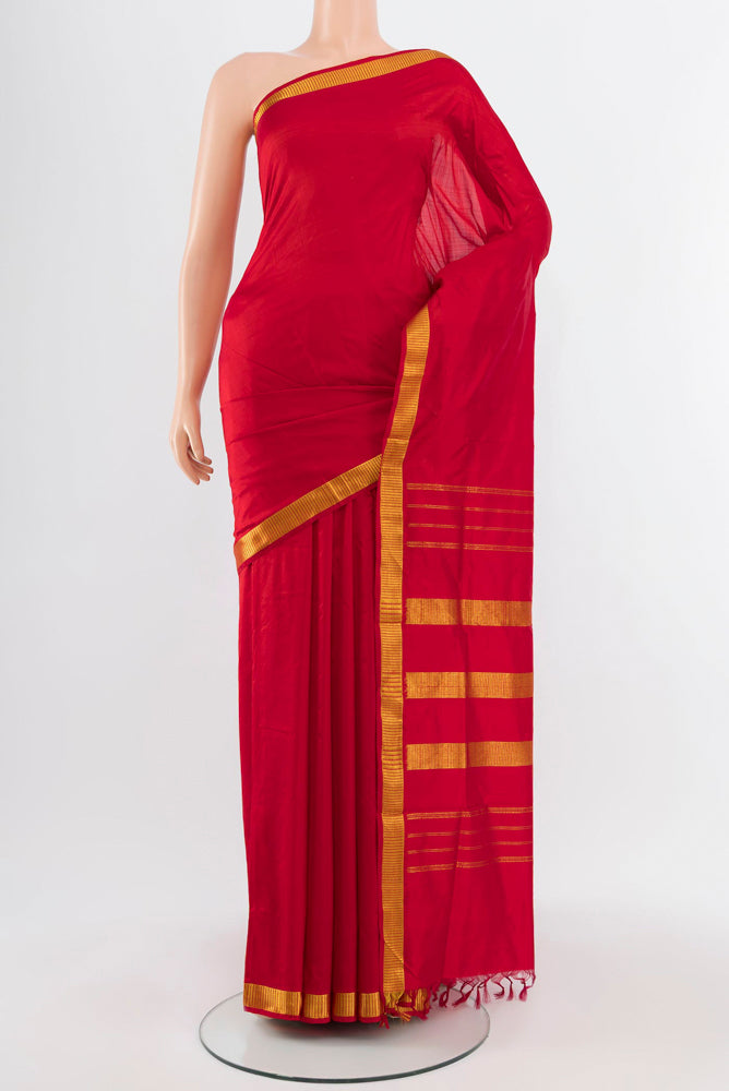 Rust Kanjivaram Silk Nine Yards Saree with Plain Body and Silk Border.  displayed on a mannequin