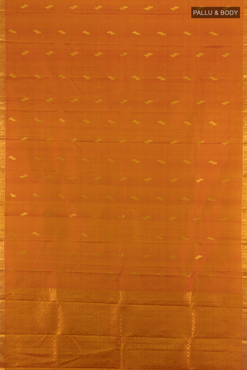 Flat view of Rust Kanchipuram Silk Saree with Zari Butta on the body and Silk Border. 