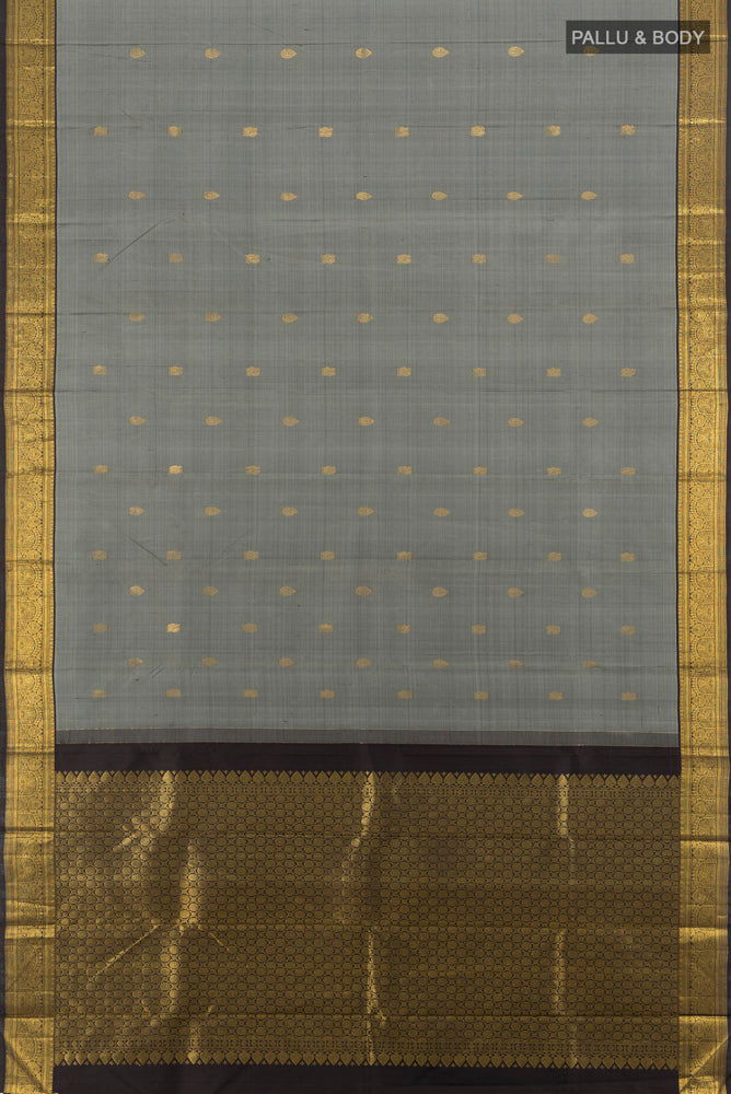 Flat view of Pure Silk Pure Zari Davys Grey Kanjivaram Saree with Zari Butta on the body and Silk Border. 