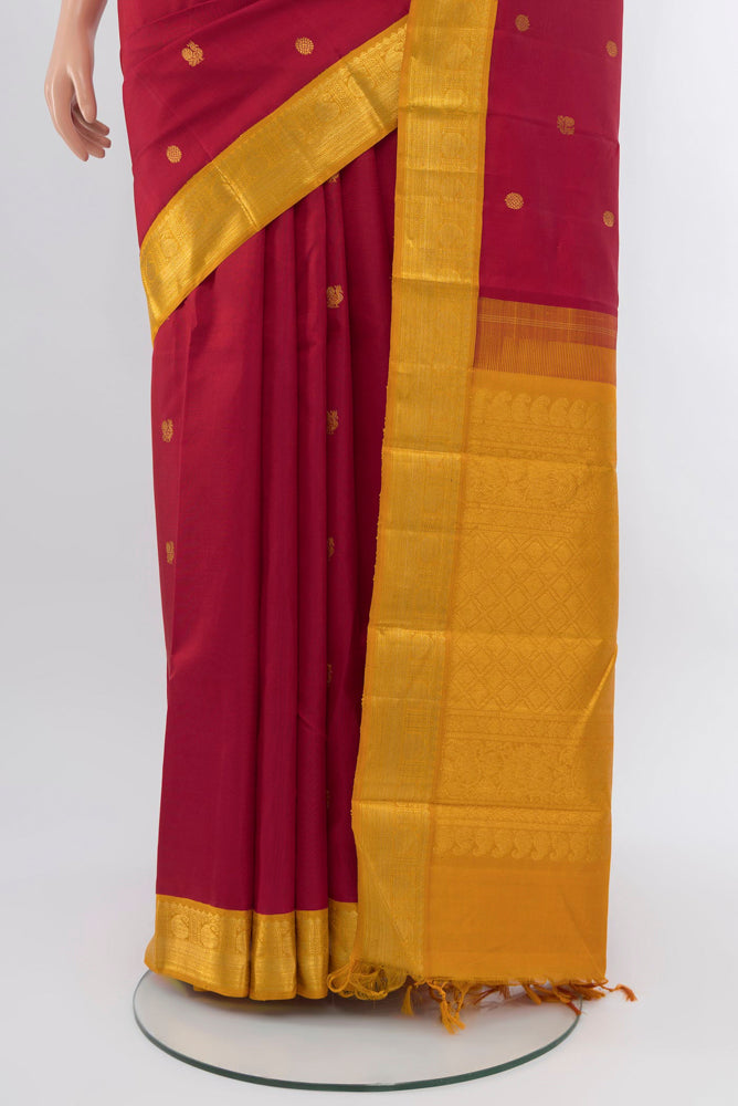 Pleats and pallu of Red Kanjivaram Silk Saree with Zari Brocade on the body and Silk Border. 