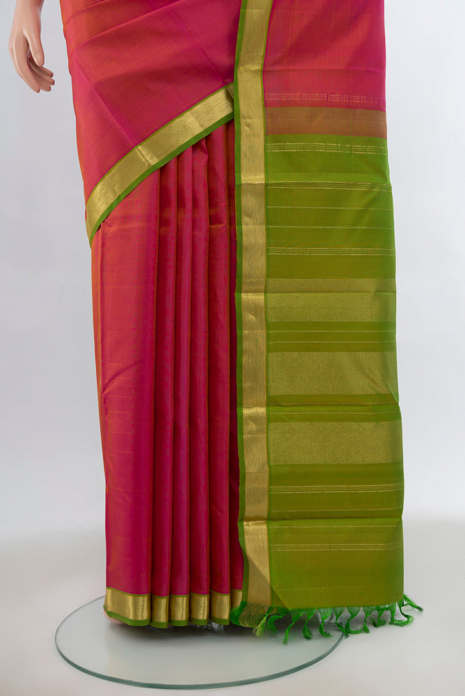 Pleats and pallu of Golden Peach Kanjivaram Silk Saree with Zari Brocade on the body and Silk Border. 