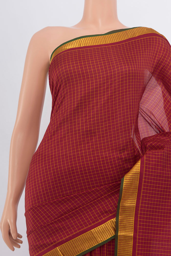 Border image of Maroon Kanchipuram Silk Saree with Checked design on the body and Silk Border. 