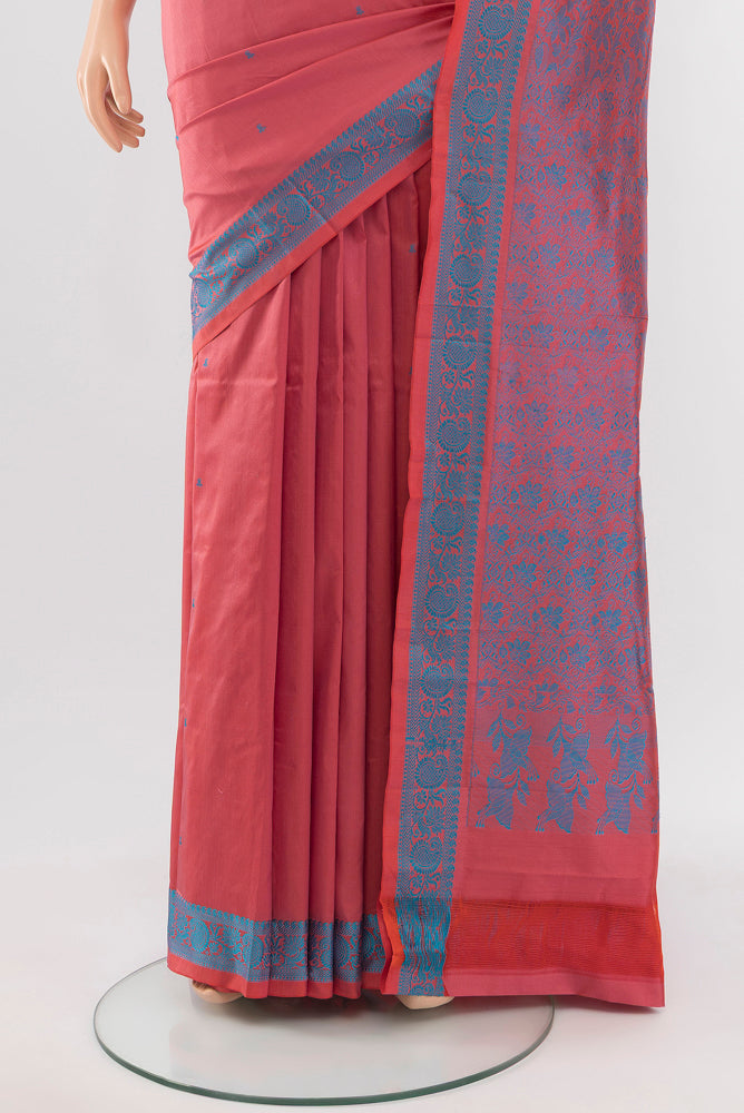 Pleats and pallu of Peach Kanjivaram Silk Saree with Zari Butta on the body and Silk Border. 