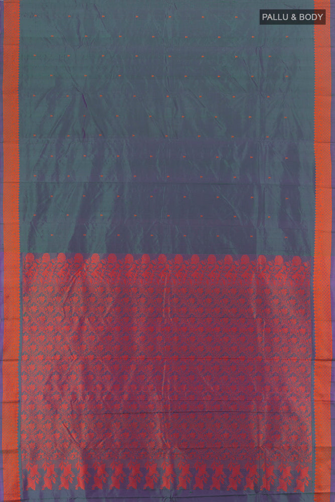 Flat view of Peacock Blue Kanjivaram Silk Saree with Jacquard With Thread Butta on the body and Silk Border. 