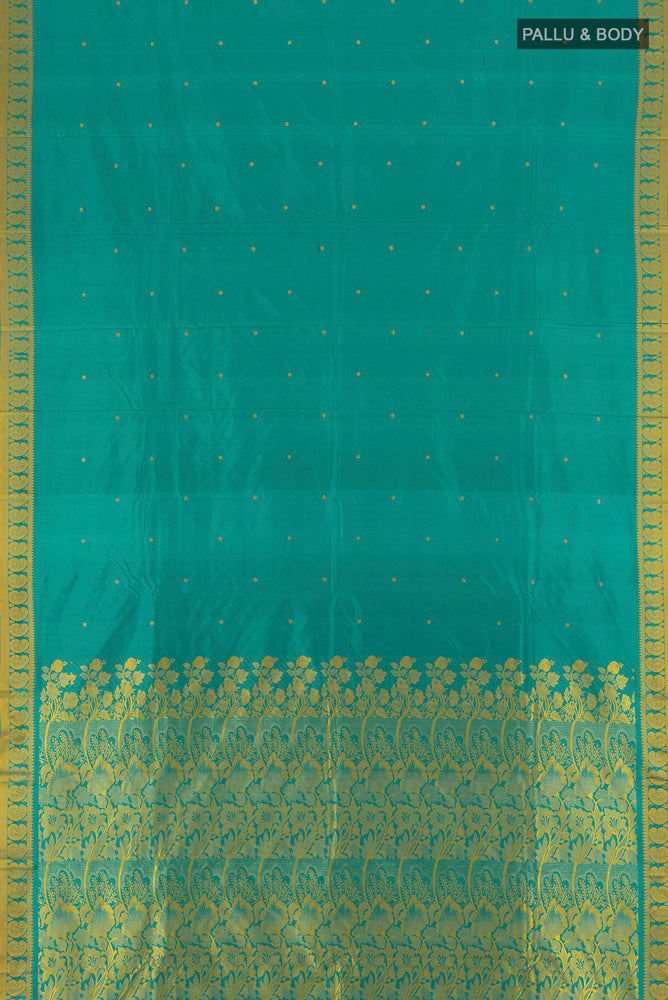 Flat view of Pure Silk Pure Zari Light Blue Kanjivaram Saree with Jacquard With Thread Butta on the body and Silk Border. 