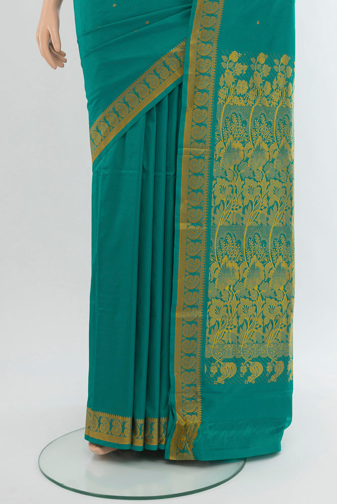 Pleats and pallu of Pure Silk Pure Zari Light Blue Kanjivaram Saree with Jacquard With Thread Butta on the body and Silk Border. 
