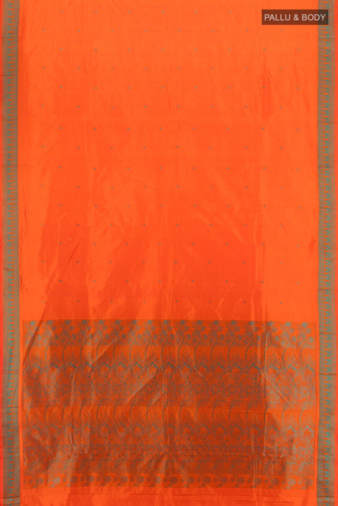Flat view of Brick Orange Kanjivaram Silk Saree with Jacquard With Thread Butta on the body and Silk Border. 