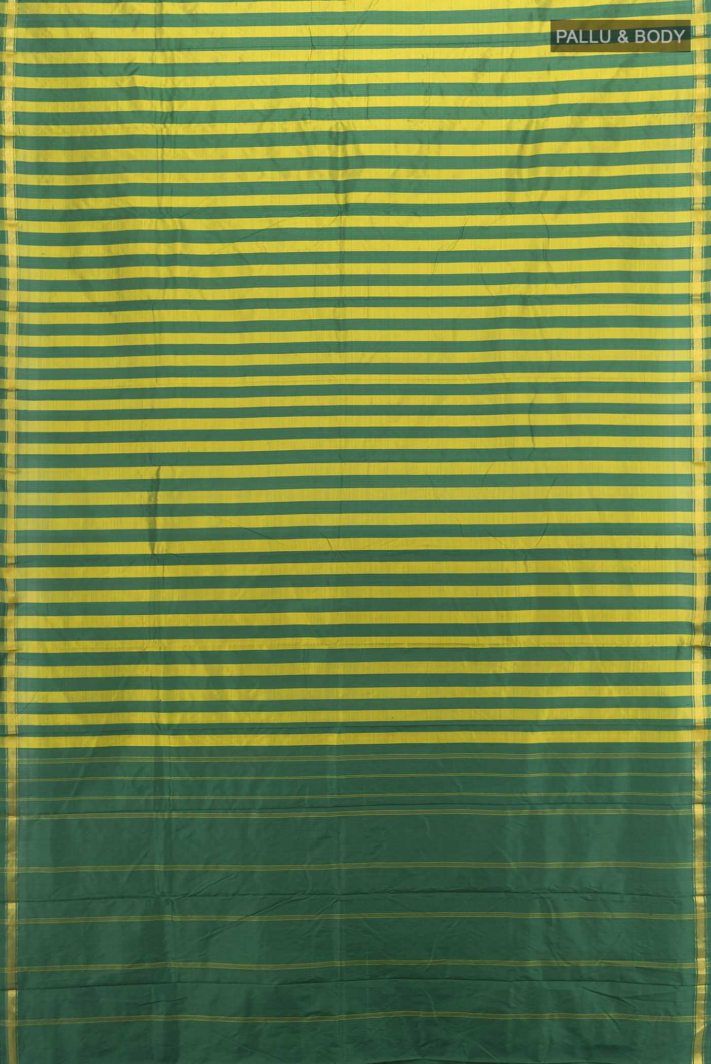 Flat view of Multi Color Kanchipuram Silk Saree with Zari Butta on the body and Silk Border. 