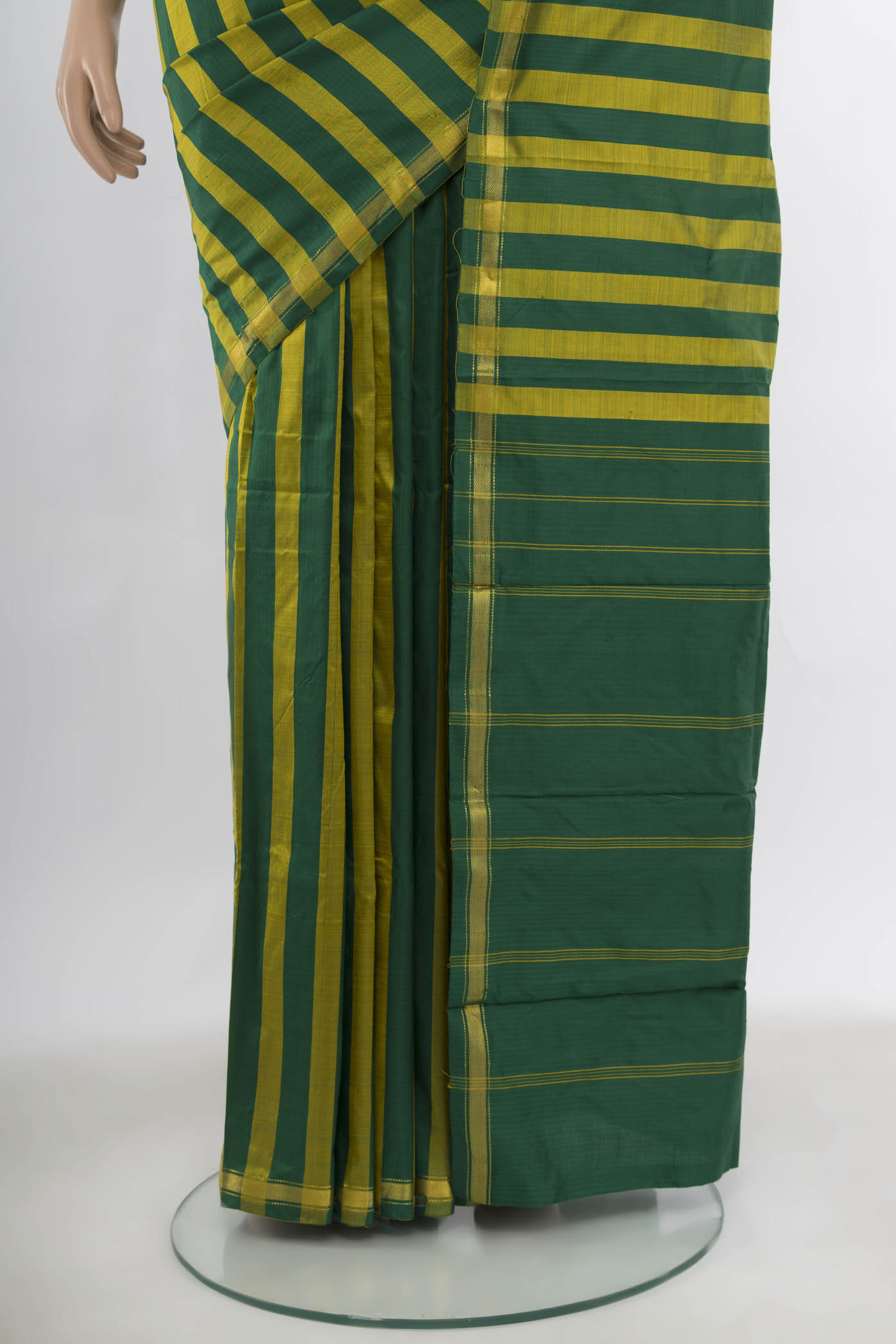 Pleats and pallu of Multi Color Kanchipuram Silk Saree with Zari Butta on the body and Silk Border. 