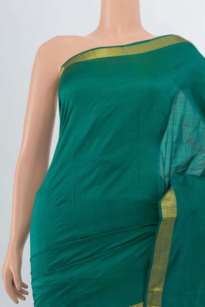 Border image of Dark Mauve Kanjivaram Silk Saree with Zari Butta on the body and Silk Border. 