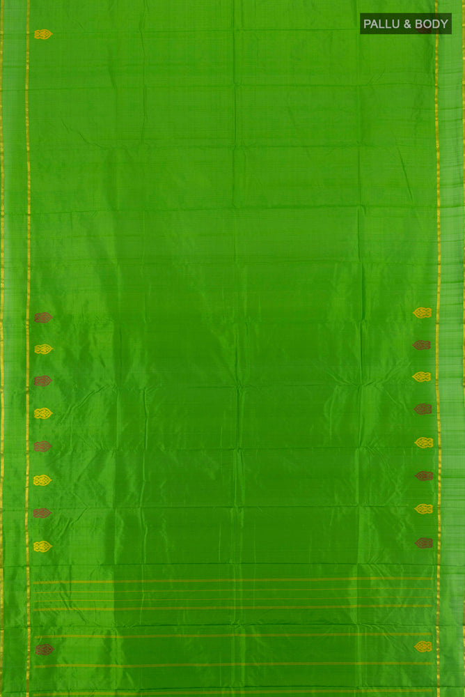 Flat view of Parrot Green Kanchipuram Silk Saree with Zari Butta on the body and Silk Border. 