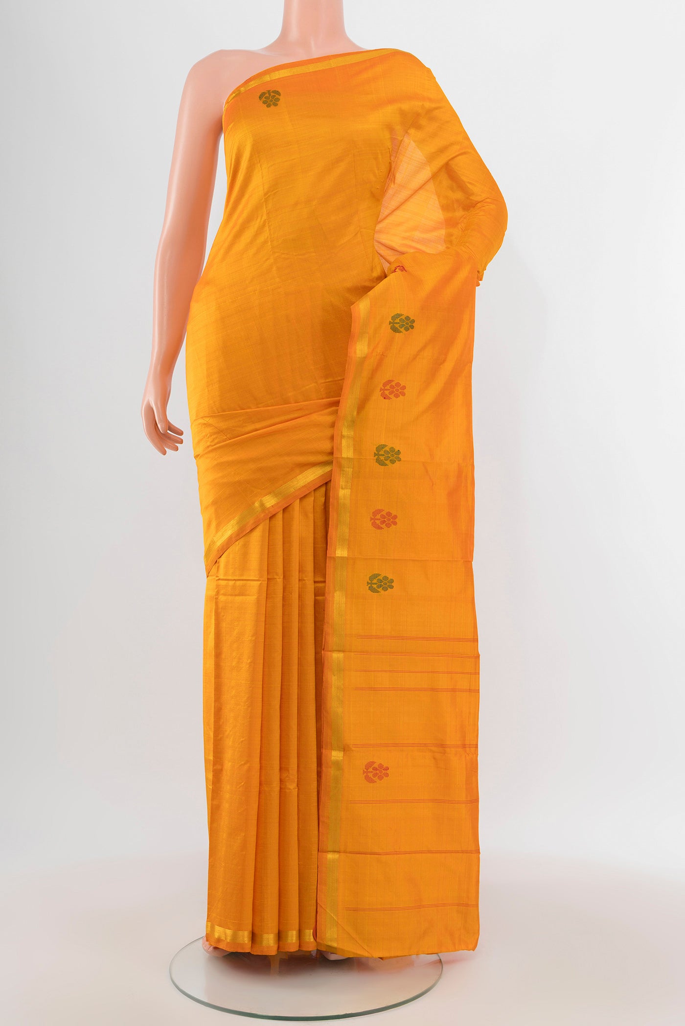Yellow Kanchipuram Silk Saree with Plain Body and Zari Border.  displayed on a mannequin