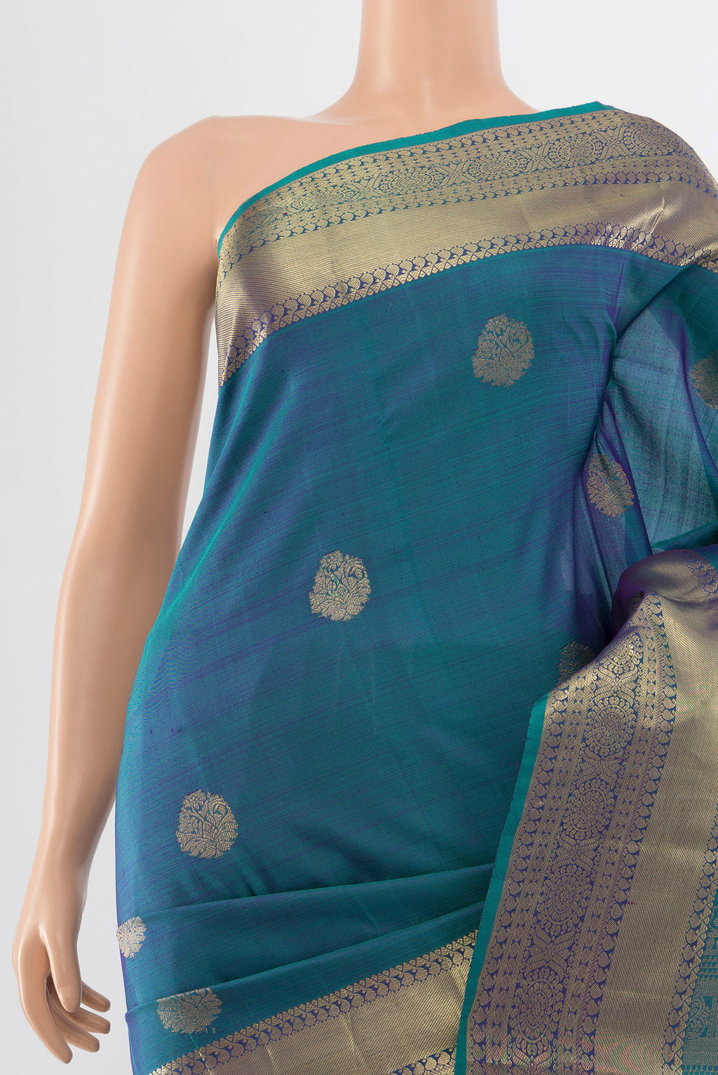 Border image of Pure Silk Pure Zari Peacock Blue Kanchipuram Saree with Zari Butta on the body and Silk Border. 