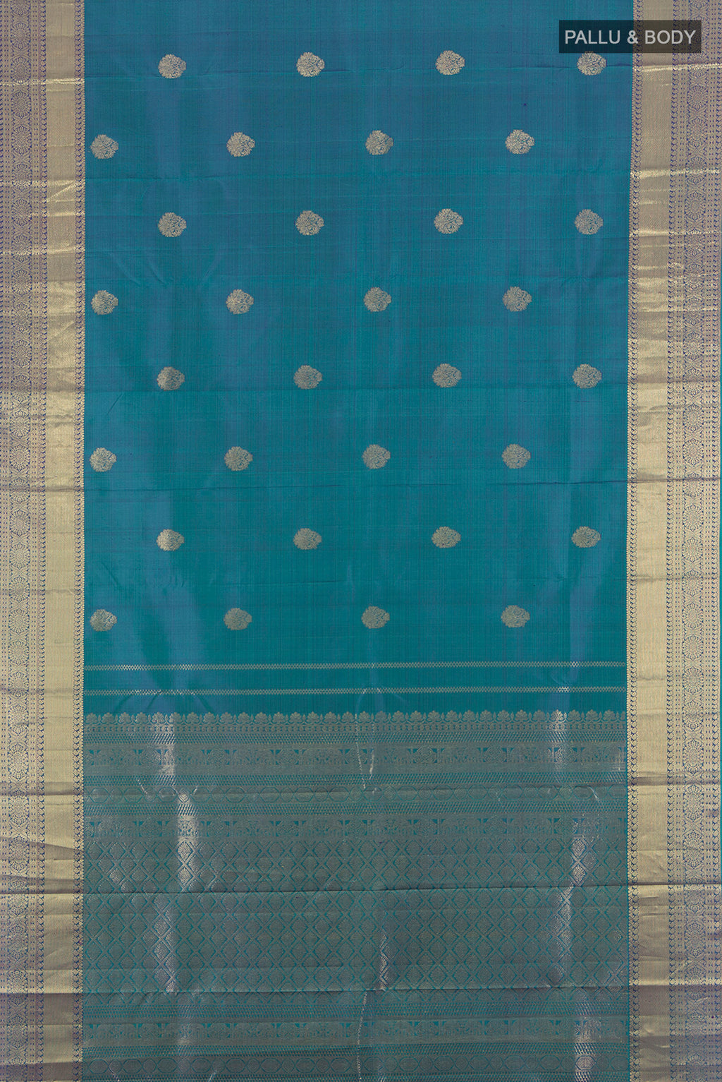 Flat view of Pure Silk Pure Zari Peacock Blue Kanchipuram Saree with Zari Butta on the body and Silk Border. 