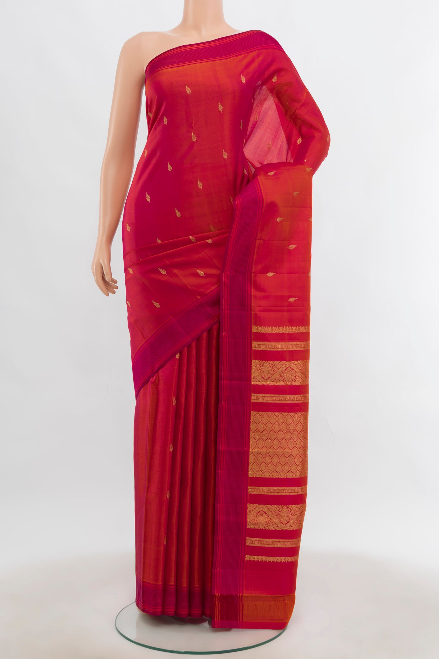 Imperial Pink Kanchipuram Silk Saree with Zari Butta on the body and Silk Border.  displayed on a mannequin