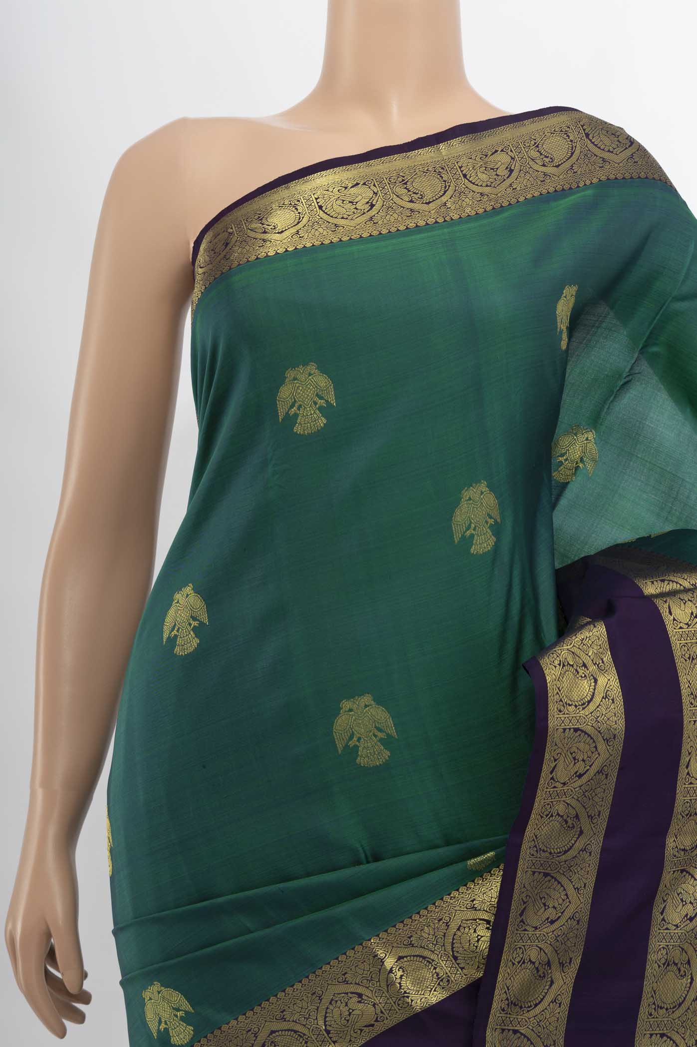Border image of Peacock Blue Kanchipuram Silk Saree with Zari Butta on the body and Silk Border. 