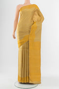 Beige Kanchipuram Silk Saree with Jacquard With Thread Butta on the body and Silk Border.  displayed on a mannequin