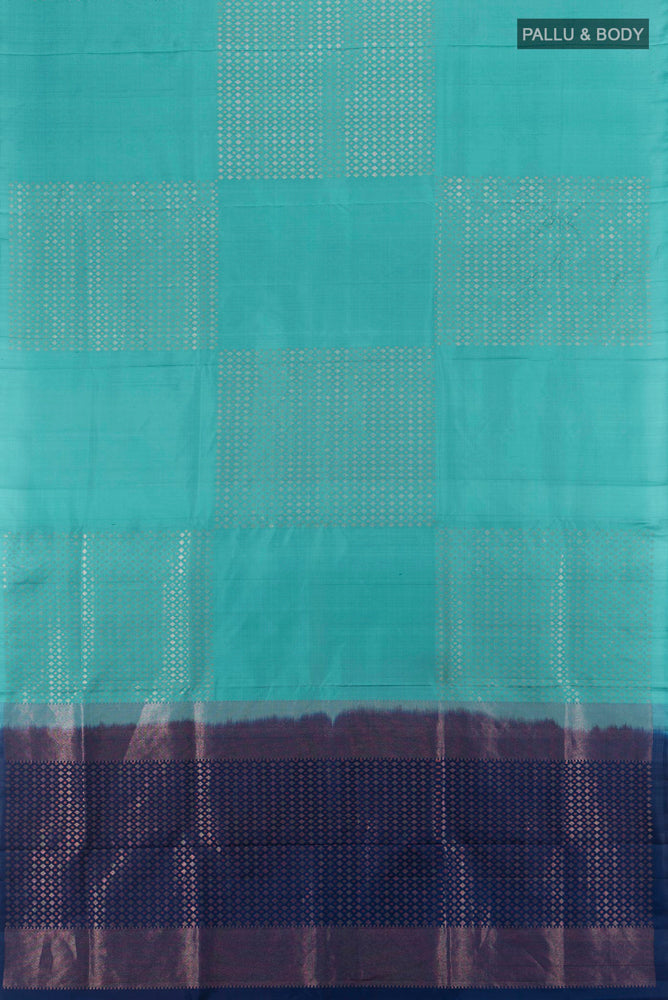 Flat view of Light Blue Soft Silk Saree with Zari Butta on the body and Silk Border. 