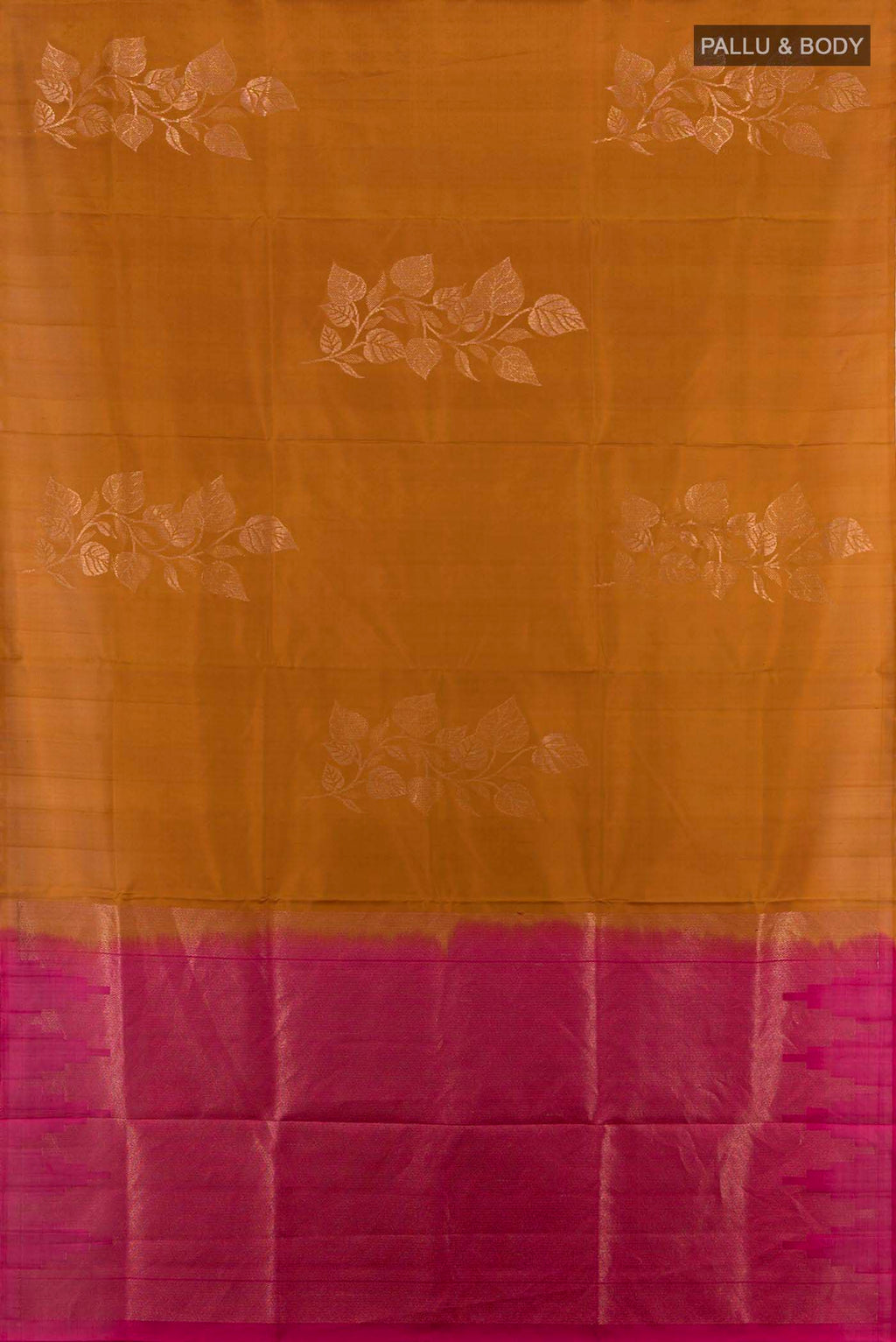 Flat view of Rust Soft Silk Saree with Zari Butta on the body and Silk Border. 