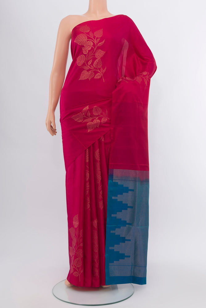 Dark Pink Soft Silk Saree with Zari Butta on the body and Silk Border.  displayed on a mannequin