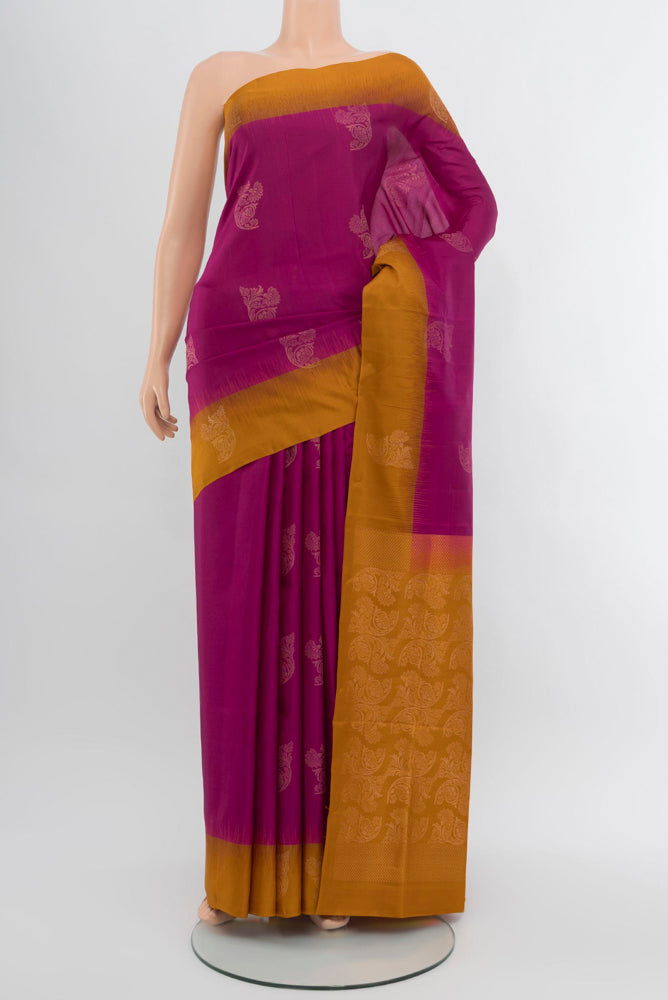 Purple Soft Silk Saree with Zari Butta on the body and Zari Border.  displayed on a mannequin