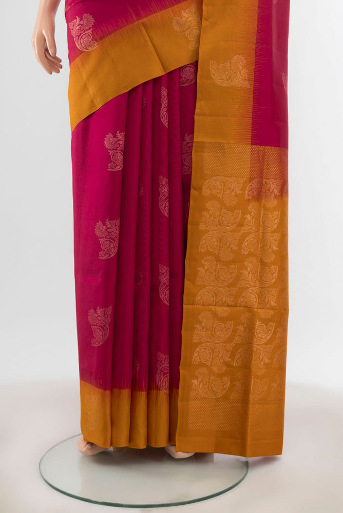Pleats and pallu of Dark Pink Soft Silk Saree with Zari Butta on the body and Silk Border. 