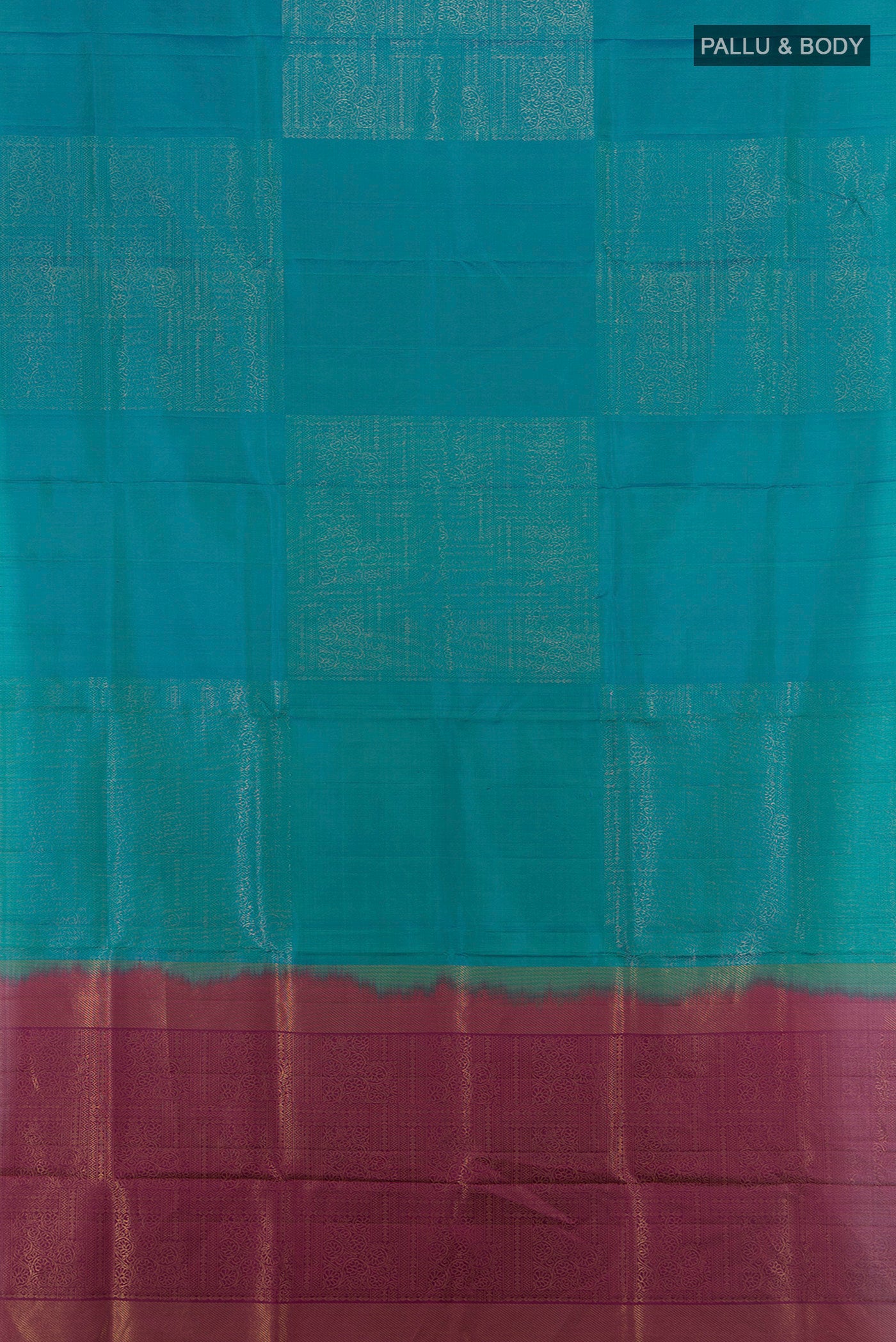 Flat view of Peacock Blue Soft Silk Saree with Plain Body and Without Border. 