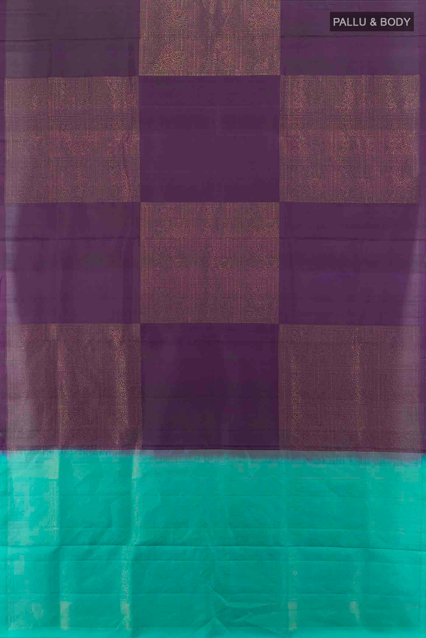 Flat view of Purple Soft Silk Saree with Zari Butta on the body and Silk Border. 