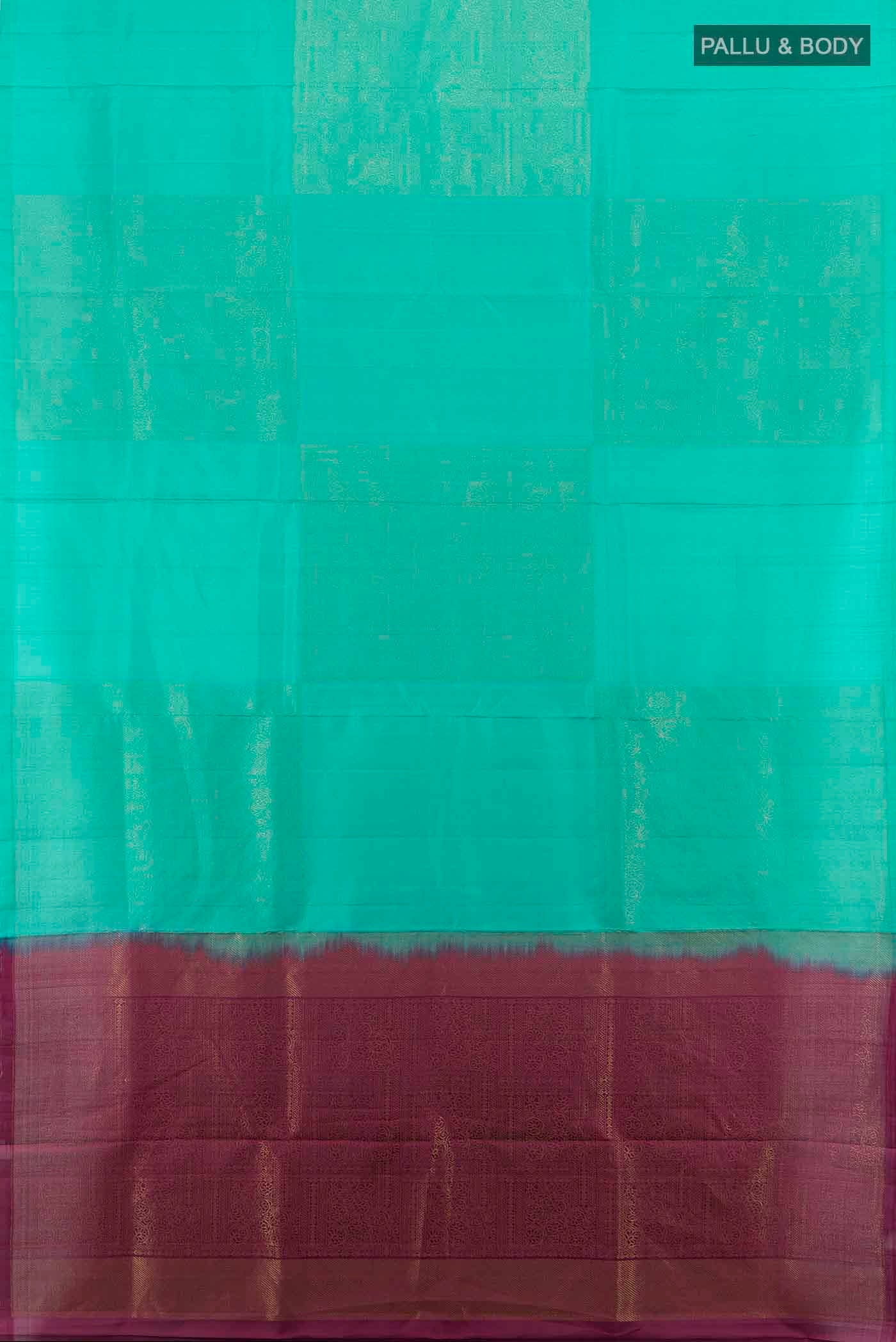 Flat view of Sky Blue Soft Silk Saree with Zari Butta on the body and Silk Border. 