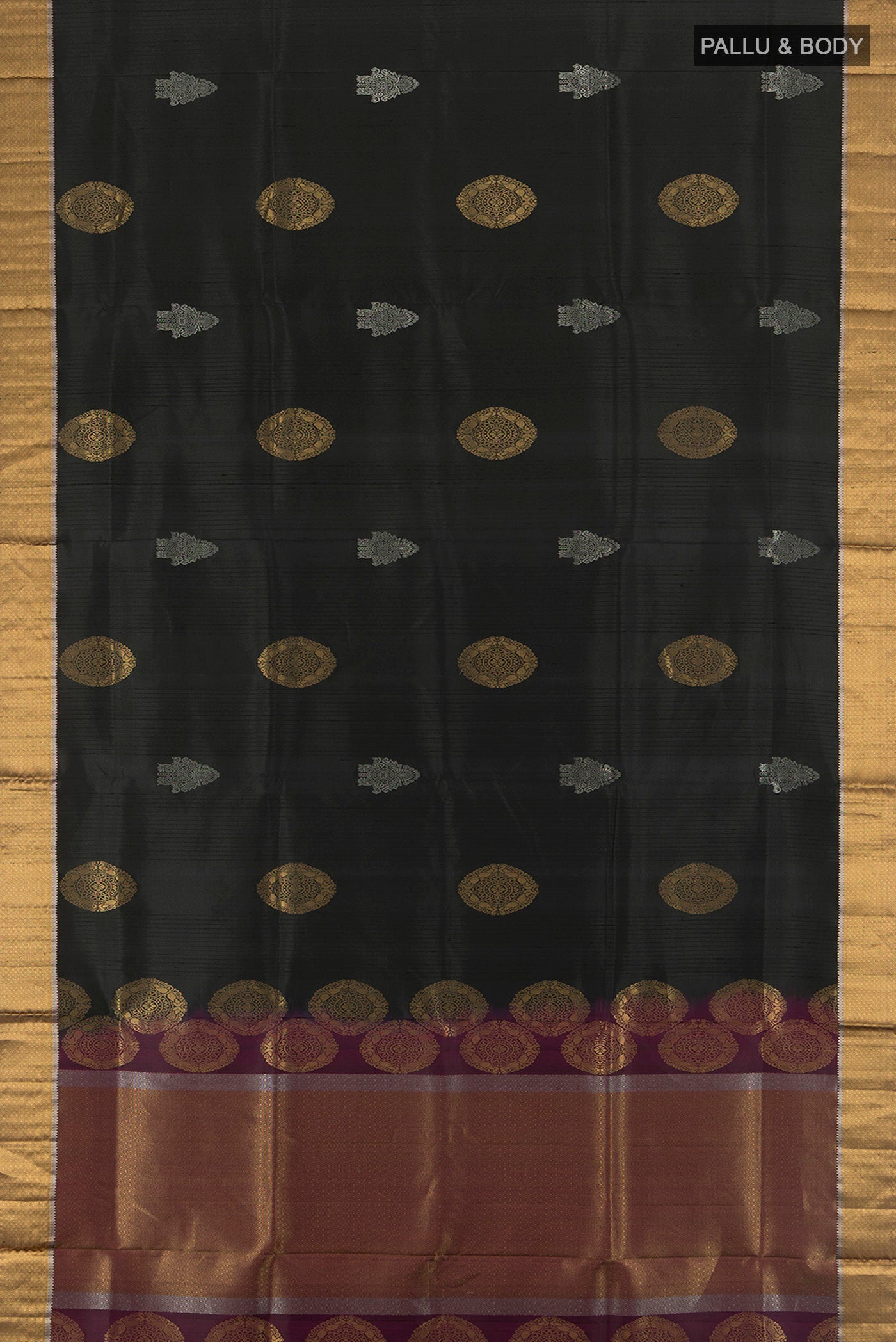 Flat view of Black Soft Silk Saree with Zari Butta on the body and Zari Border. 