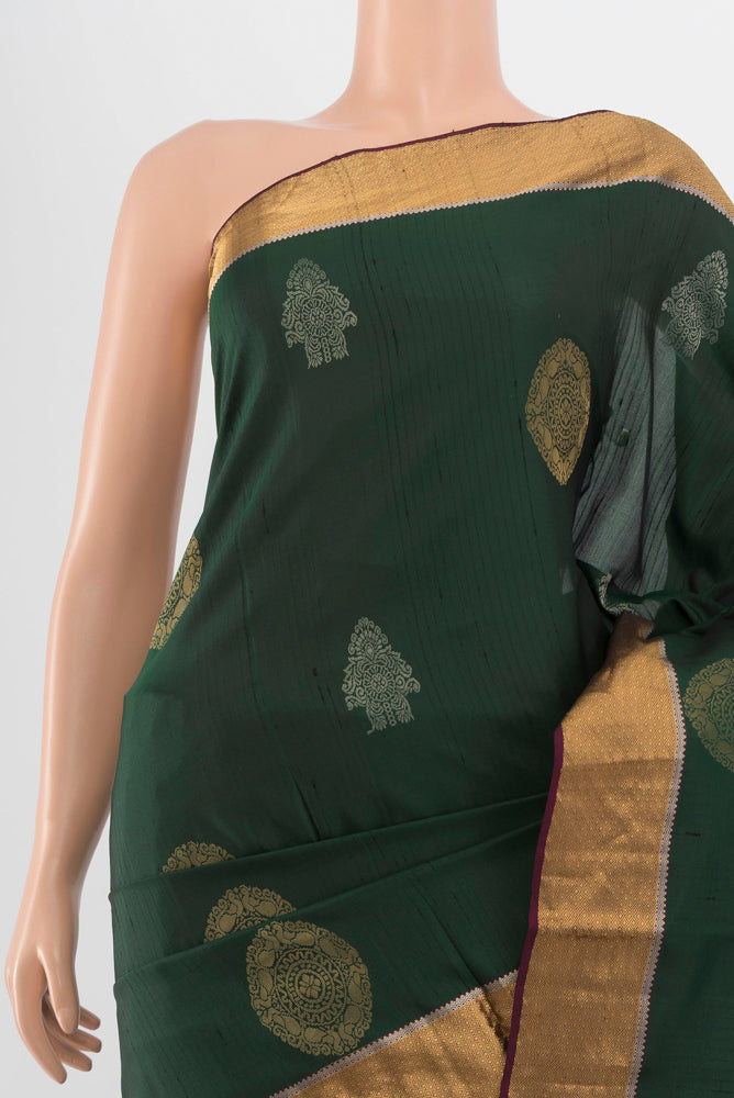 Border image of Bottle Green Soft Silk Saree with Zari Butta on the body and Silk Border. 