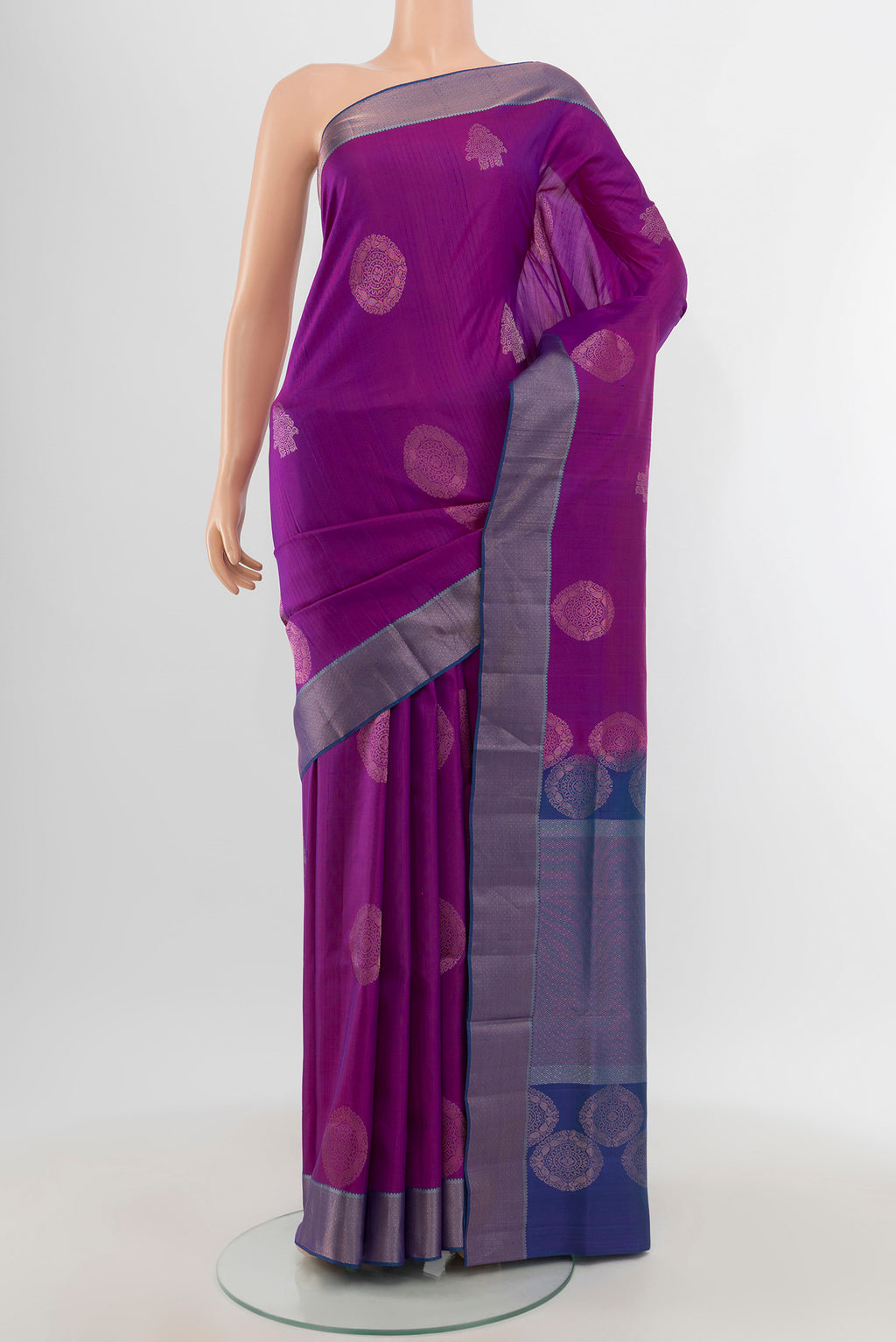 Violet Soft Silk Saree with Zari Butta on the body and Zari Border.  displayed on a mannequin